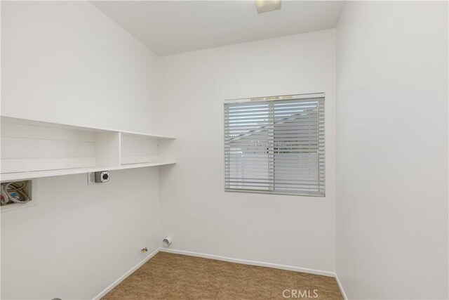 laundry area with electric dryer hookup and gas dryer hookup