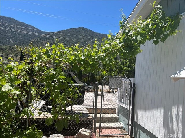 exterior space featuring a mountain view