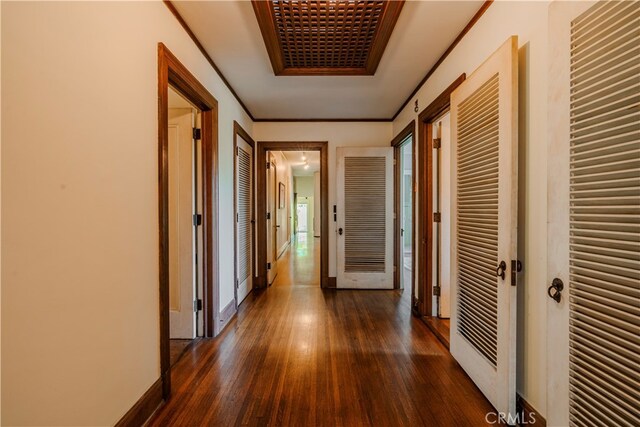 hallway with dark wood-type flooring