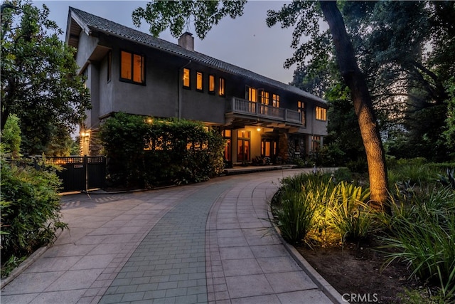 view of front of home with a balcony