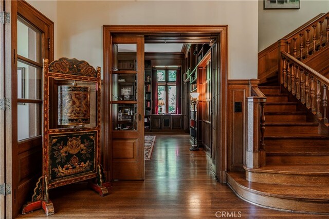 corridor featuring hardwood / wood-style flooring