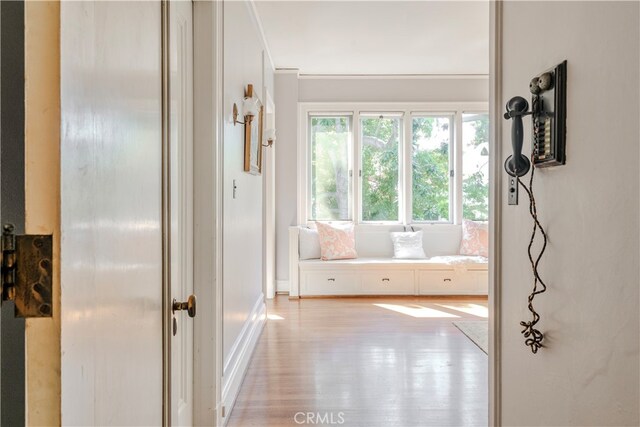 hall with light wood-type flooring