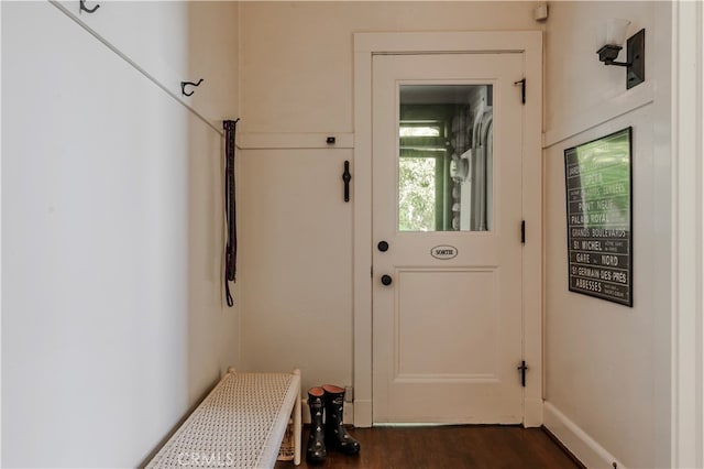 doorway with dark hardwood / wood-style flooring