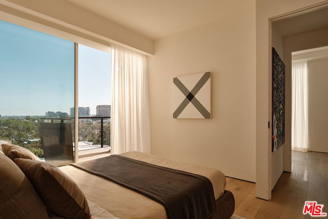 bedroom featuring hardwood / wood-style floors