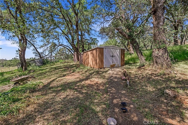 view of yard with a shed