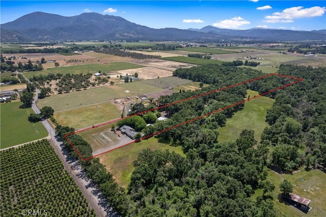 bird's eye view with a mountain view and a rural view