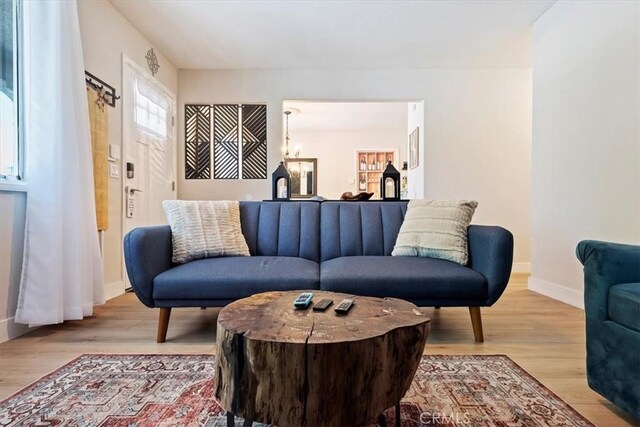 living room featuring light wood-type flooring