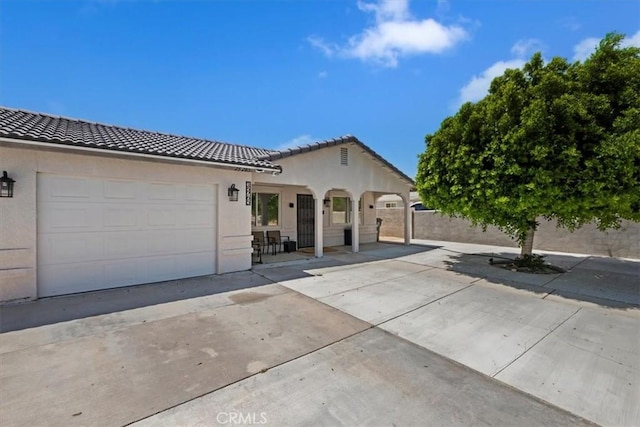 view of front of property featuring a garage