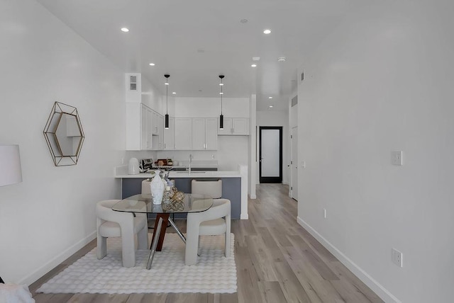 dining room featuring light hardwood / wood-style floors