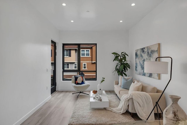 living area with light hardwood / wood-style floors