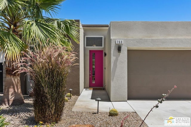 entrance to property with a garage