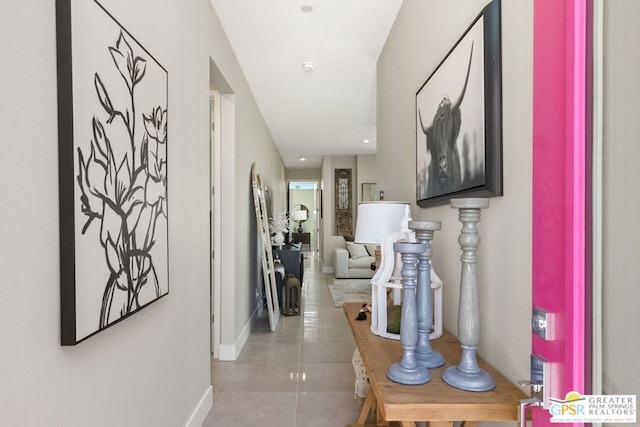 hallway with light tile patterned floors