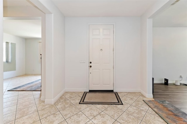 view of tiled foyer entrance