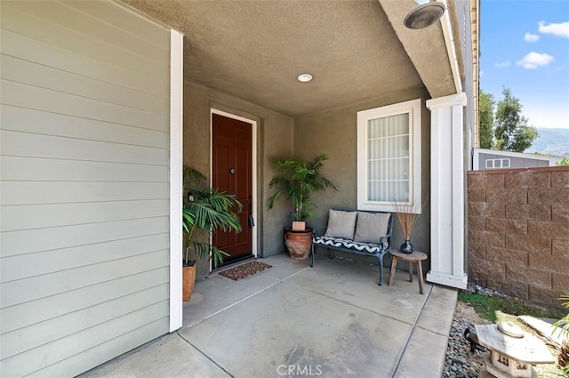 entrance to property with a patio