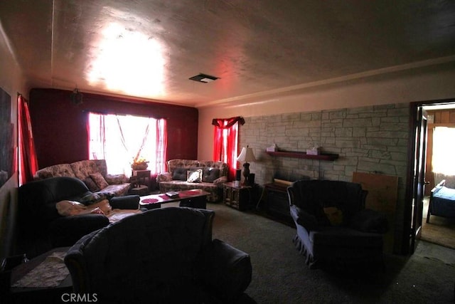 living room with carpet floors and a fireplace