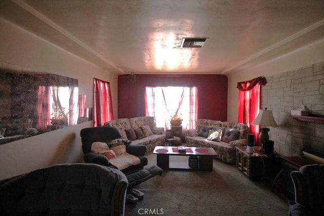 carpeted living room featuring a fireplace