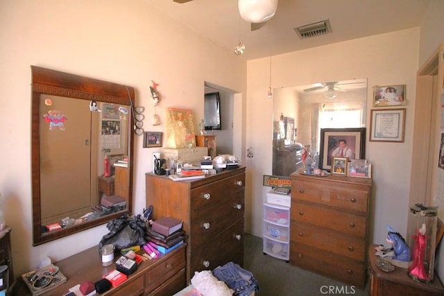 interior space featuring ceiling fan