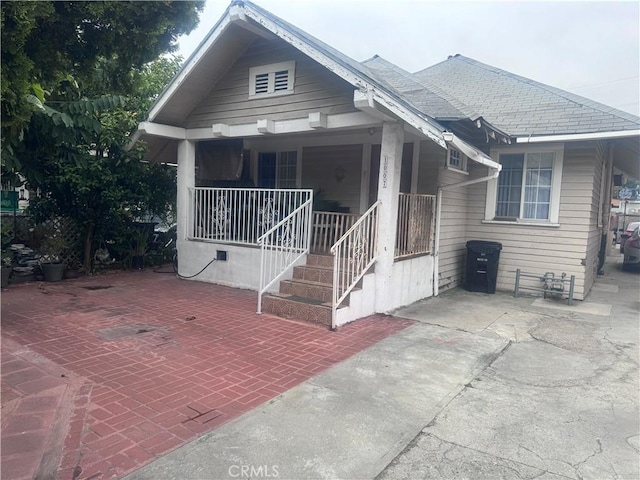 bungalow-style home featuring a porch