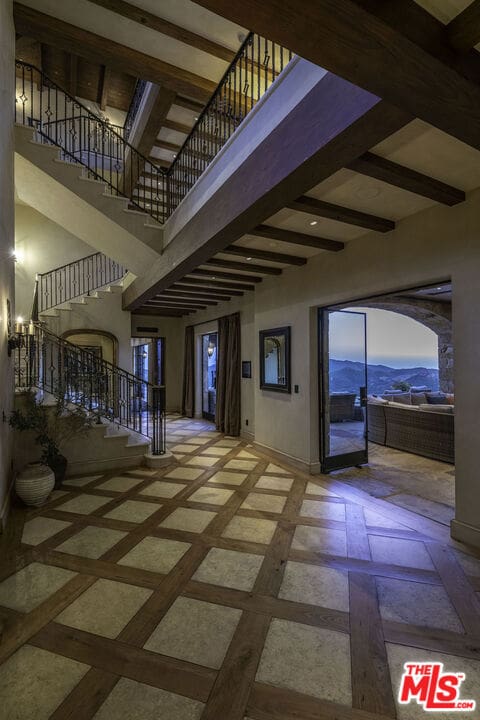 interior space featuring tile flooring and a mountain view