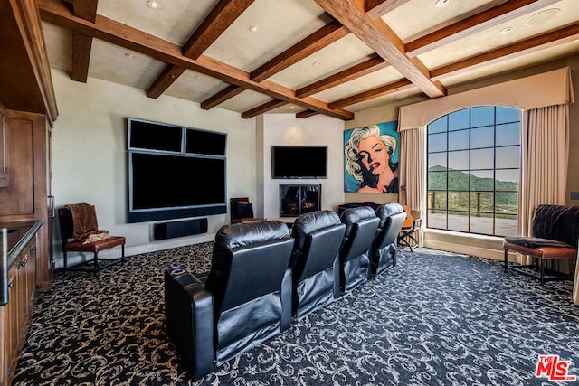 home theater featuring carpet flooring, beamed ceiling, and coffered ceiling