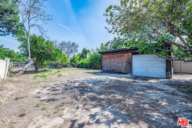 exterior space featuring a storage shed