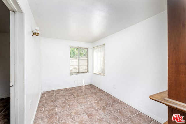 view of tiled spare room