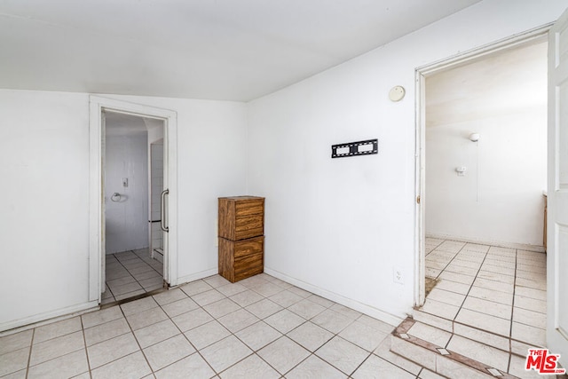 view of tiled spare room