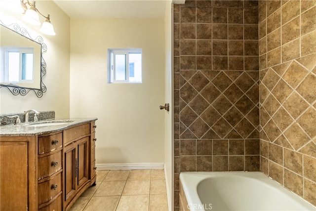 bathroom featuring tile floors and vanity