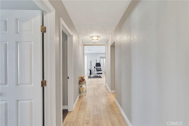 hall featuring light hardwood / wood-style flooring