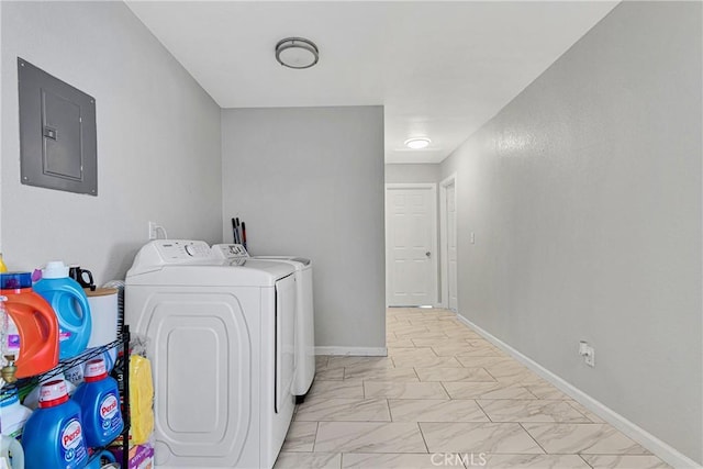 clothes washing area featuring independent washer and dryer and electric panel