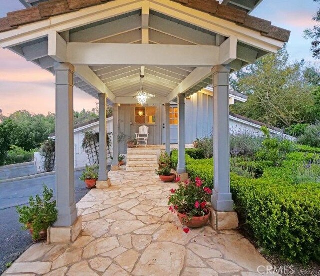 view of patio terrace at dusk