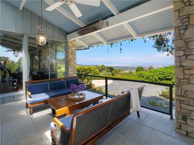 view of patio with ceiling fan and outdoor lounge area