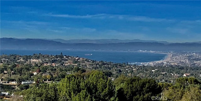 property view of mountains featuring a water view