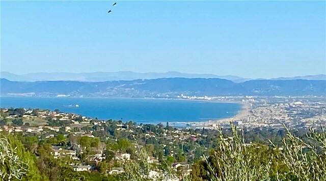 property view of mountains featuring a water view