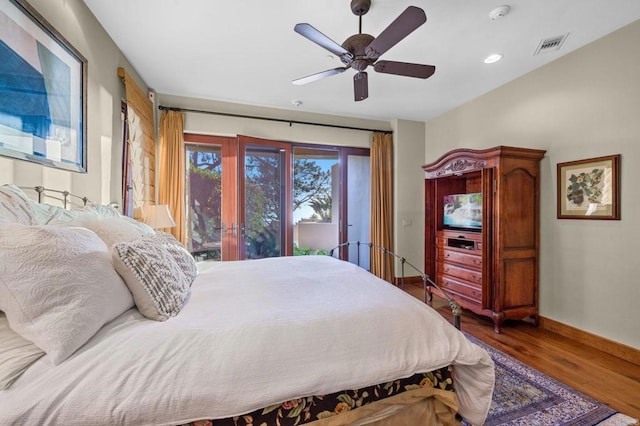 bedroom featuring ceiling fan and hardwood / wood-style flooring