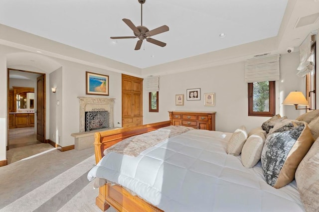 carpeted bedroom featuring ceiling fan