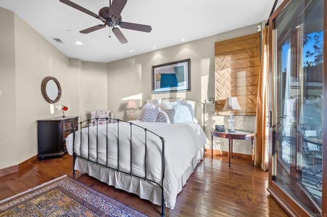 bedroom featuring dark wood-type flooring and ceiling fan