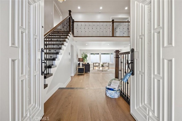 entrance foyer featuring wood-type flooring