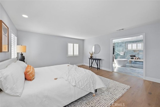 bedroom featuring hardwood / wood-style floors