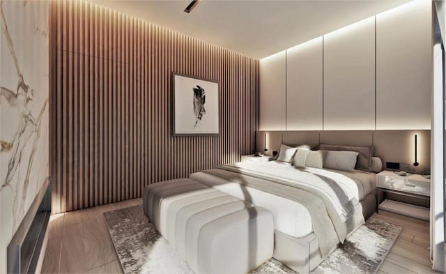 bedroom featuring light hardwood / wood-style floors