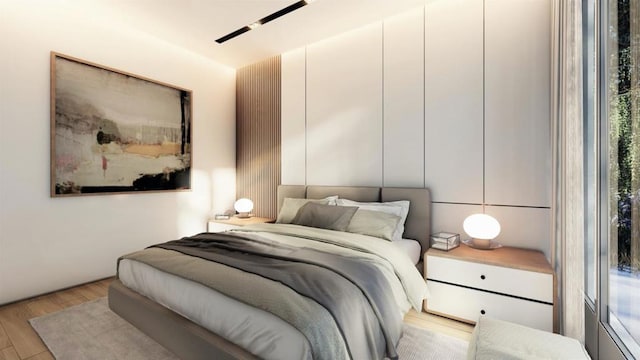 bedroom featuring light wood-type flooring