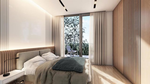 bedroom with expansive windows