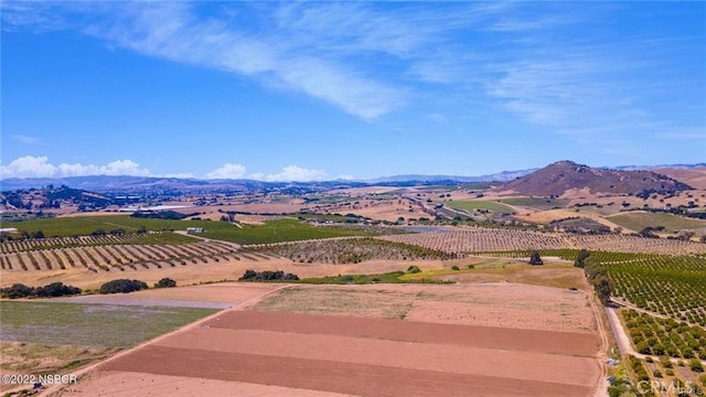 mountain view featuring a rural view