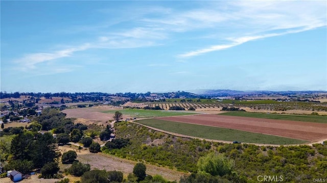 aerial view with a mountain view and a rural view