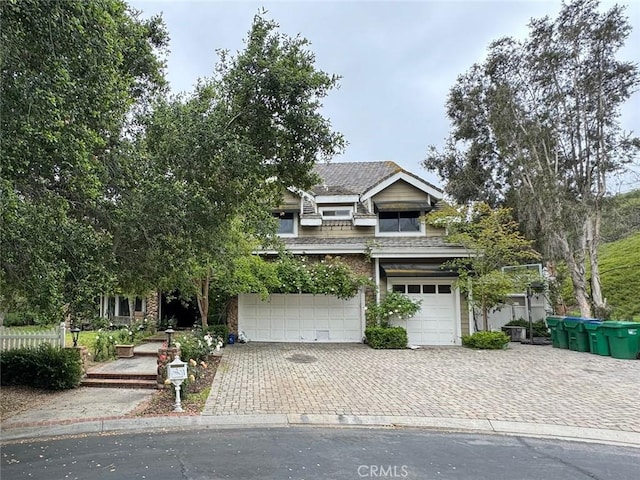 view of front of property featuring a garage