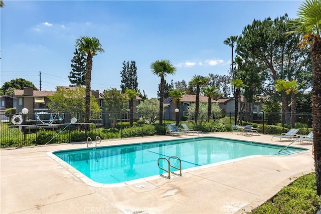 view of pool featuring a patio