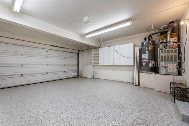 garage with strapped water heater