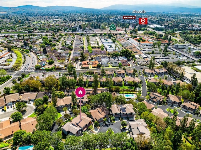 drone / aerial view featuring a mountain view