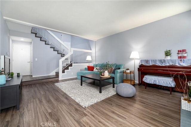 living room with dark hardwood / wood-style floors