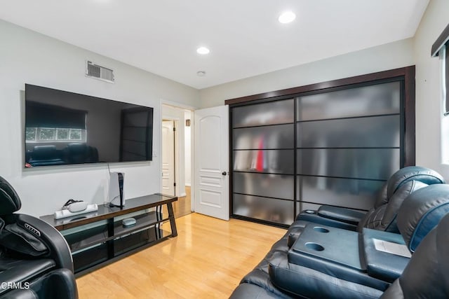 living room with light hardwood / wood-style flooring